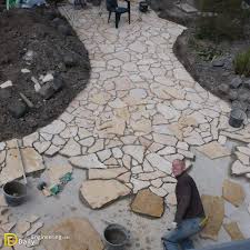 how to install flagstone patio daily