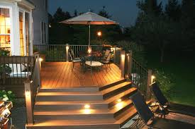 Cedar Deck Stain With Dark Gray Trim And Black Wrought Iron
