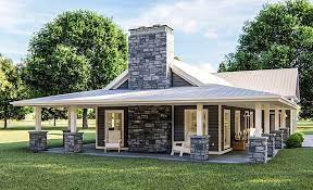 This sophisticated modern farmhouse plan has a broad front porch with a shed roof with exposed rafter tails. Pole Barn House Design Guide Designing Idea