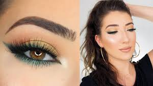 green smokey winged eyeliner makeup