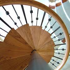 spiral staircase with wood treads and