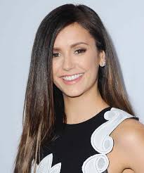 nina dobrev plays volleyball in a