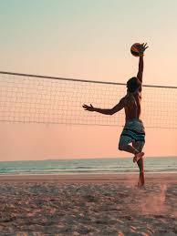 man playing beach volleyball