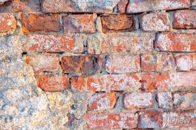 Old Crumbling Brick Wall Background