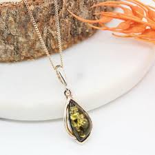 925 sterling silver and green amber