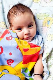 cute cheerful indian baby boy infant in