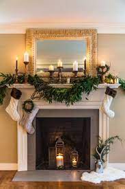 A Fireplace With Candles Or Lights