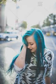 An index page listing hair colors content. Blue Haired Punk Girl Looking Down While Standing On A City Street Stock Photo Offset