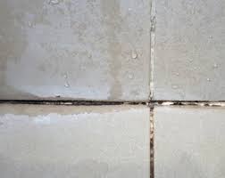to regrout tiles without removing old grout