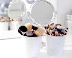 professionals clean makeup brushes