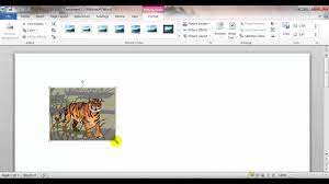 inserting sizing and moving clip art