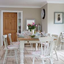 A finely set dining room table with china and crystal creates the mood for an elegant dining experience with friends, family, or business associates. Dining Room Paint Ideas Colours And Decor Effects To Create Atmospheric Dining Areas