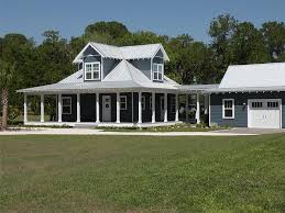 country ranch home w wrap around porch