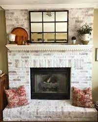 white wash brick fireplace