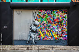 Graffiti Art On The Street Wall In The