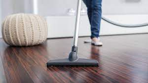 vacuuming wood floors
