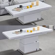 Great savings & free delivery / collection on most of the extendable tables you will find on ebay operate on the same basic principles. Elgin Extendable Coffee Converting Dining Table In White Gloss Sale