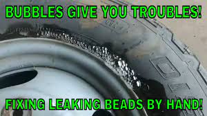 FIXING A FLAT TIRE MANUALLY! BEAD LEAKING - YouTube