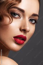 young woman with red lipstick portrait