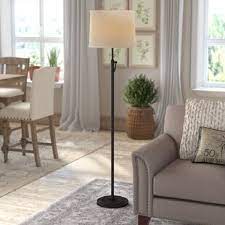 When the sun goes down, the farmhouse living room relies on table lamps to provide small sources of gentle light that cast a lot of shadows. Vintage Oil Rain Lamp Wayfair