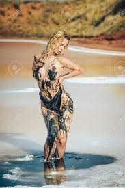 Beautiful Naked Girl In A Mud Bath. Spa Treatments And Body Care. Enjoying  Alternative Mud Bath Therapy. Relax And Rest. Natural Care On Spa  Treatments. Stock Photo, Picture And Royalty Free Image.