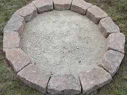 Make an opening air to get into the pit by turning one of the blocks at a slight angle. How To Build A Patio Block Fire Pit Lowe S Canada