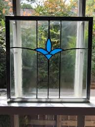 art nouveau flower stained glass window