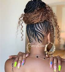 If you want to demonstrate the fun dye job, then this hairstyle has an edgy faux hawk impact, where the braid on the top ends up with a man bun. 21 Trendy Ways To Shake A Cornrow Updo Women Blog
