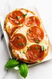This keto pizza chaffle recipe also happens to be one of those work arounds, and it is currently our favorite keto pizza! Chaffle Pizza Recipe Keto