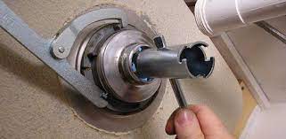 remove and install a kitchen sink strainer