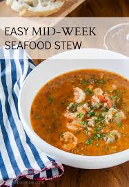 Add tomato, season with salt and pepper, and cook, stirring frequently, until tomato is breaking down, about 3 minutes. Easy Seafood Stew Infinebalance Seafood Soup Recipes Seafood Stew Easy Seafood