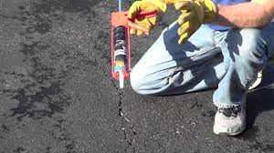 How to Fill Driveway Cracks - Driveway Crack Filler - YouTube