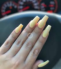 Wait a moment to dry and brush off excess 4. Pastel Yellow Matted Coffin Or Ballerina Nails In Medium Length Acrylic Nails Pastel Ballerina Acrylic Nails Acrylic Nails Yellow