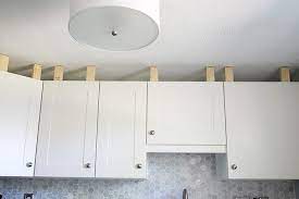 crown molding to kitchen cabinets