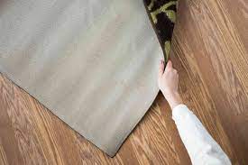 6 ways flatten an area rug