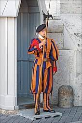 On special occasions, the guard wears a ceremonial dress uniform that includes a forged breast plate, a ruff, and white gloves. Swiss Guard Wikipedia
