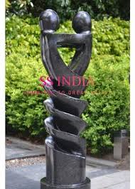 black stone abstract couple statue