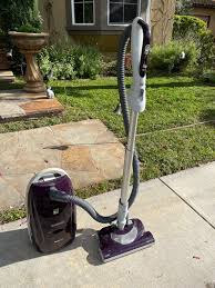purple kenmore canister vacuum with