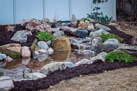 Custom Landscaped Water Feature In Quad
