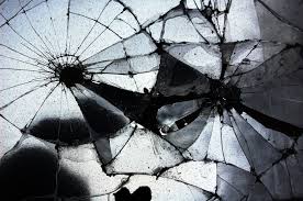 Image result for looking in a shattered mirror