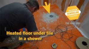 heated floor under tile in a shower l