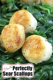 Find healthy scallop recipes including broiled and baked scallop recipes, from the food and nutrition experts at eatingwell. Pan Seared Scallops Recipe With Wilted Spinach The Dinner Mom