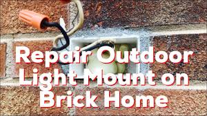 repair outdoor light mount on brick