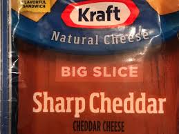 big slice sharp cheddar cheese