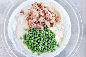 Traditional tuna noodle casserole is made with cream of mushroom soup, egg noodles, peas and of course tuna. Tuna Noodle Casserole The Gunny Sack