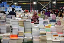 Schooled in not giving a shit. World S Largest Book Sale Comes To Middle East At Giant Hangar In Dubai Reuters