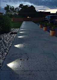 Recessed In Ground Lighting Suddenly Turns This Pathway Into A Nightime Feature Outdoor Lighting Design Driveway Lighting Landscape Lighting Design