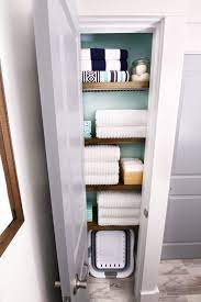 This linen closet makeover is the first of many projects! How To Organize A Small Linen Closet Abby Lawson