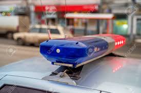 The Roof Mounted Lightbar Of Police Car