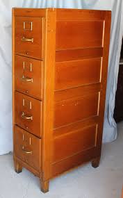 antique oak four drawer file cabinet on